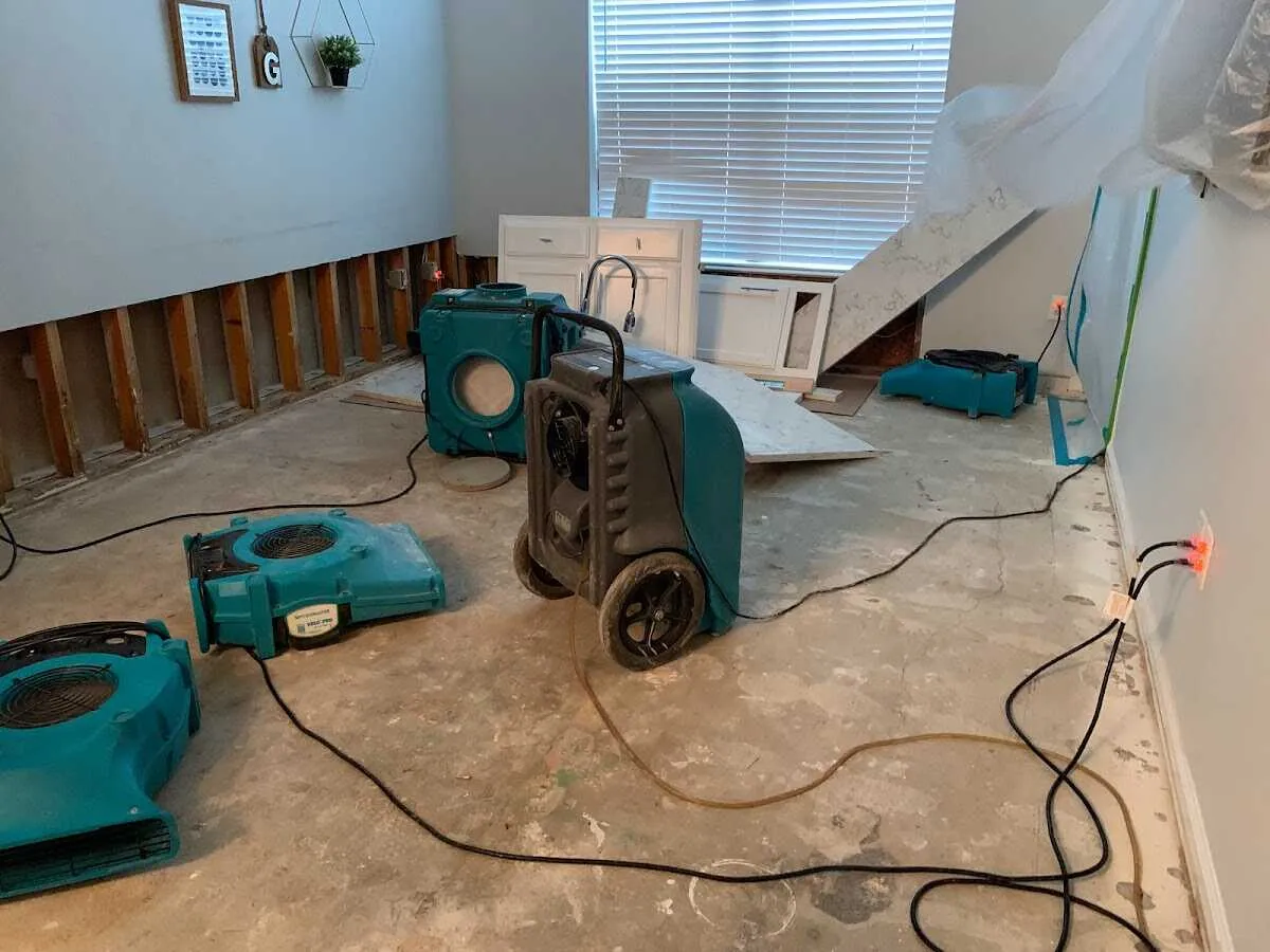 Dehumidifier in flood-cut room for Water Damage Restoration in South Salt Lake